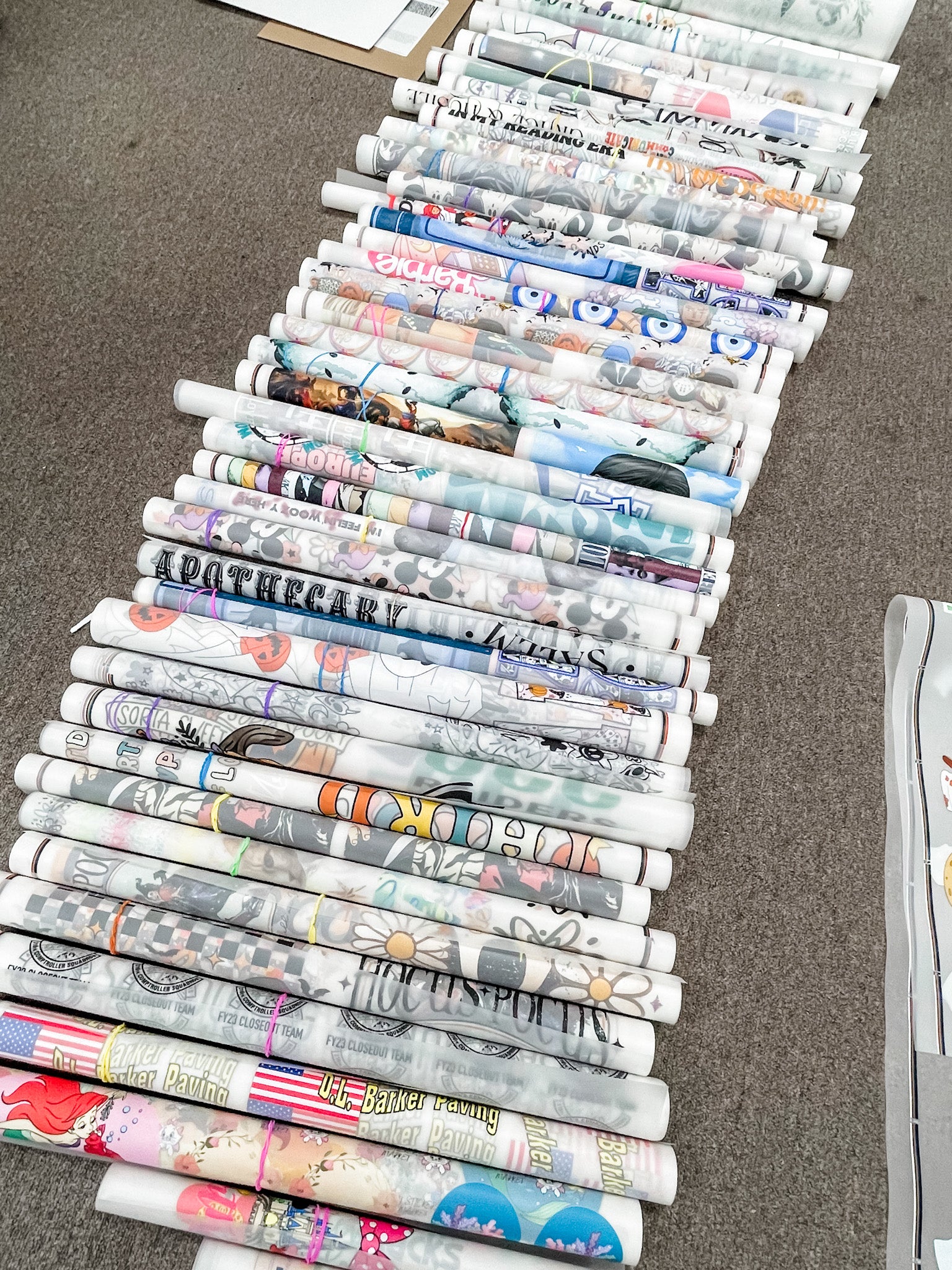 Custom DTF transfer design rolls ready to press with vibrant full-color prints for t-shirts, hoodies, and apparel by RBA Transfers.