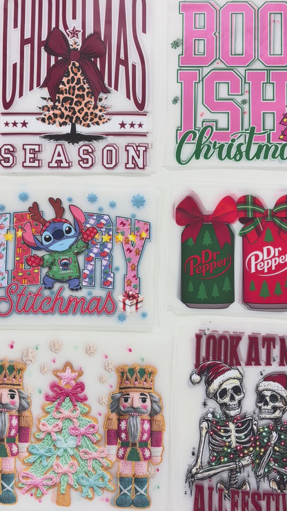 Video showcasing a large collection of cut and ready-to-press DTF transfer designs with vibrant full-color prints for custom apparel.